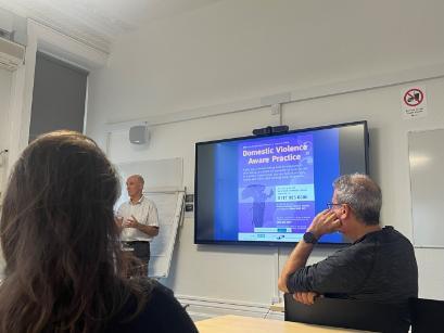 Professor Feder speaking at an event